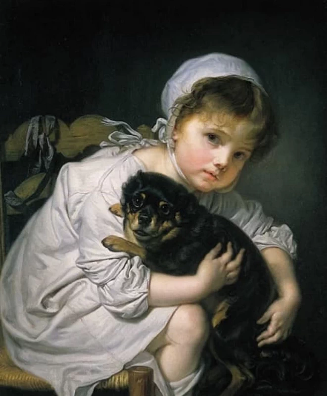 Bambina con un cane